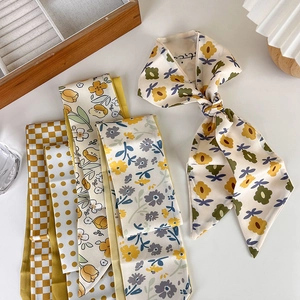 Elegant yellow floral silk hair scarf and neck ribbon collection for versatile bag styling