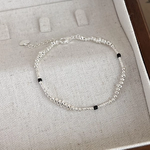 Vintage silver metal beaded bracelet with black pearls and heart charm extension