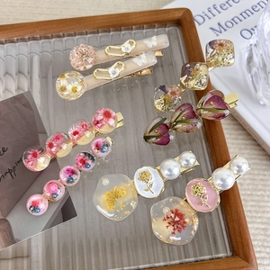 Handmade vintage resin hair clips with dried flowers and pearls in various shapes