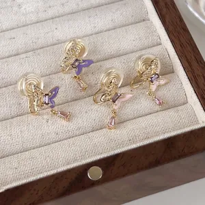 Boucles d'oreilles papillon en zircon avec émail coloré et gouttes de cristal rose