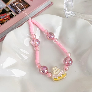 Pink tulip style beaded phone lanyard featuring sweet resin bunny cake charm accessory