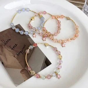 Sweet Japanese strawberry crystal bracelets with gold heart and star charms set of four