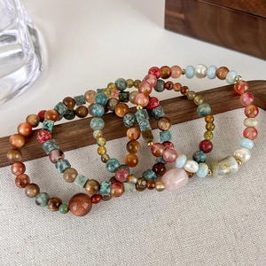 Ethnic bohemian four-piece beaded bracelet set with colorful natural stones and pearls