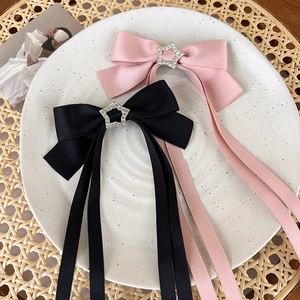 Pink and black satin bow hair clips with star rhinestones and long ribbon tassels
