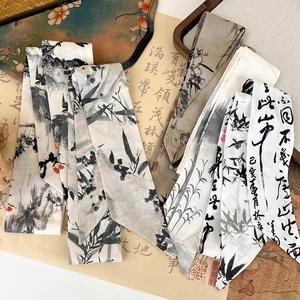Detail view of New Chinese style silk hair ribbons featuring ink wash bamboo and crane designs