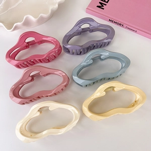 Glossy acrylic wavy hair claw clips in colorful lacquer finish for women