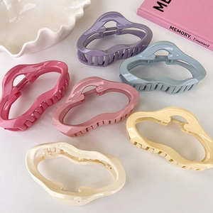 Set of six colorful irregular acrylic claw clips in French cloud style for women