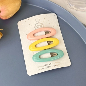 Lot de trois barrettes BB ovales aux couleurs macaron avec paillettes sur carte
