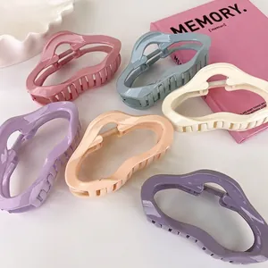 Set of 6 French irregular wavy hair claws in matte Morandi colors on a white background