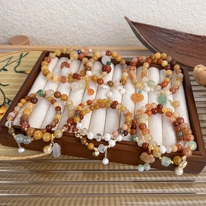 Bracciale multistrato in stile cinese con perline colorate e ciondoli a forma di zucca