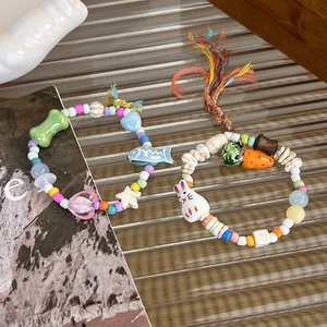 Cute ceramic bunny and carrot beaded bracelet with colorful handmade woven ropes