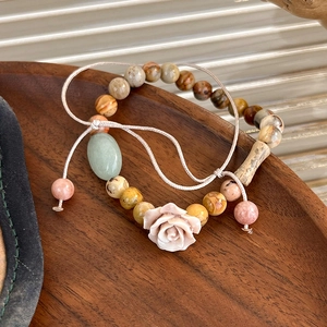 Handmade retro beaded bracelet set featuring carved pink rose and green jade stone charms