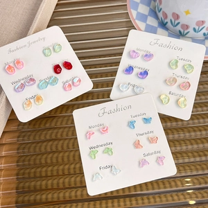 Colorful resin butterfly and heart earring set on weekly fashion display card