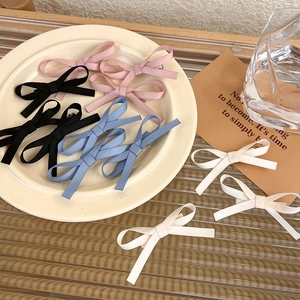 French lace style ribbon bow hair clips in pink black blue and white colors