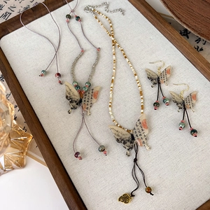 New Chinese style butterfly jewelry set featuring ink calligraphy and tassel details
