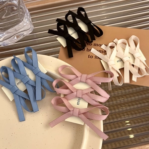 French lace style bow hair clips set in black, blue, pink, and beige colors for women