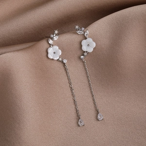 Exquisite 925 silver shell flower earrings with rhinestone drop pendant on brown silk