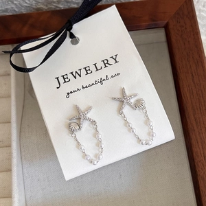 Boucles d'oreilles étoile de mer avec perles et glands pour style de plage
