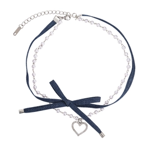 Double-layered denim choker with white pearls, denim bow, and silver heart pendant