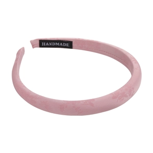 Pink jacquard silk padded headband with handmade label for elegant high cranial top look