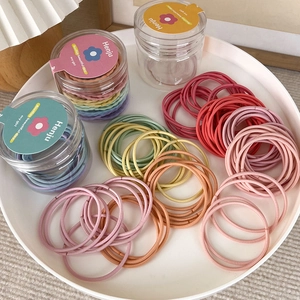 48 colorful high-elastic hair ties in a clear storage jar with dopamine macaron shades