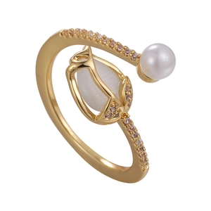 Elegant gold tulip ring with white pearl and opal stone on a clean white background
