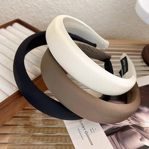 Three-piece set of satin padded headbands in black, cream and coffee for voluminous hairstyle