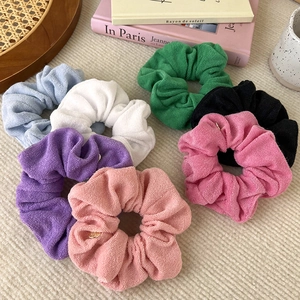 Set of 7 colorful terry cloth hair scrunchies with elegant gold metal nameplates