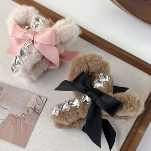 Elegant plush hair claw clips with satin bows and sparkling heart-shaped rhinestones