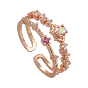 Rose gold double layer crown ring featuring pear-shaped gemstone and pink zircon accent