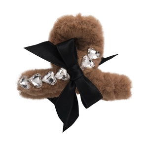 Brown plush claw clip with black ribbon bow and heart-shaped rhinestones for women