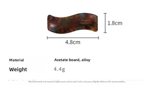 Detailed macro view showing the 4.8cm brown tortoiseshell acetate wavy hair clip dimensions
