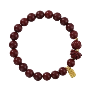 Vintage Chinese style cinnabar red bead bracelet with lotus flower and gold lucky charm