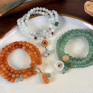 Handcrafted multi-layer green agate beaded bracelet with floral and gourd charms