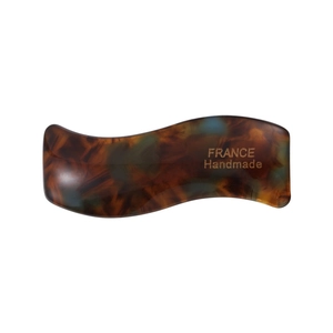 Handmade wavy acetate hair clip in tortoiseshell pattern with France gold lettering