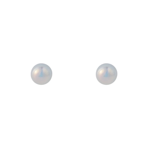 Detailed view of spherical pearl stud earrings with a luxury iridescent mermaid glow