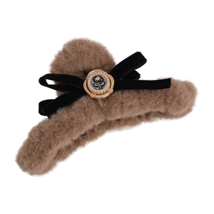 Brown plush claw clip with black velvet bow, vintage rose camellia and white pearl detail