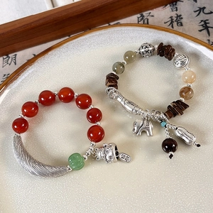 Ethnic elephant beaded bracelet set with red agate and wood beads in retro style