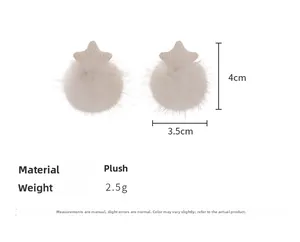 Detail view of plush star earrings featuring soft white faux fur texture and compact design