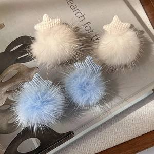 Winter plush star stud earrings with faux fur balls and knitted stars in soft colors
