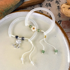 Vintage Chinese style white resin bangles with flower charm, lock pendant and tassels