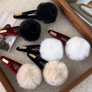 Plush ball hair clips in velvet fabric with handmade metal tag for autumn winter styling