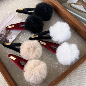 Set of four plush pompom BB hair clips in black burgundy white and beige velvet finish