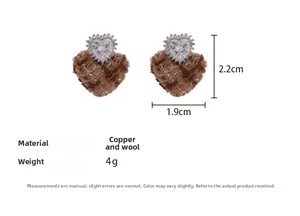 Detailed size view of brown plaid heart earrings with rhinestones and copper material