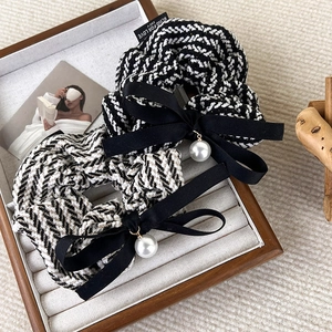 Elegant set of two tweed scrunchies with black ribbons and white hanging pearls