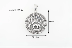 Macro detail of Viking bear paw pendant with runic inscriptions and dimensions