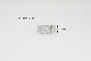 Detail view of 9.1g silver men's ring with a large moissanite and geometric patterns