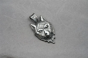 Detailed macro view of retro 3D wolf head pendant with Nordic rune engravings
