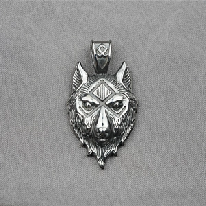 Retro stainless steel wolf head pendant necklace with Nordic runes on grey background