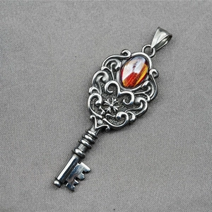 Retro stainless steel cross key pendant with amber-like stone inlay for necklaces